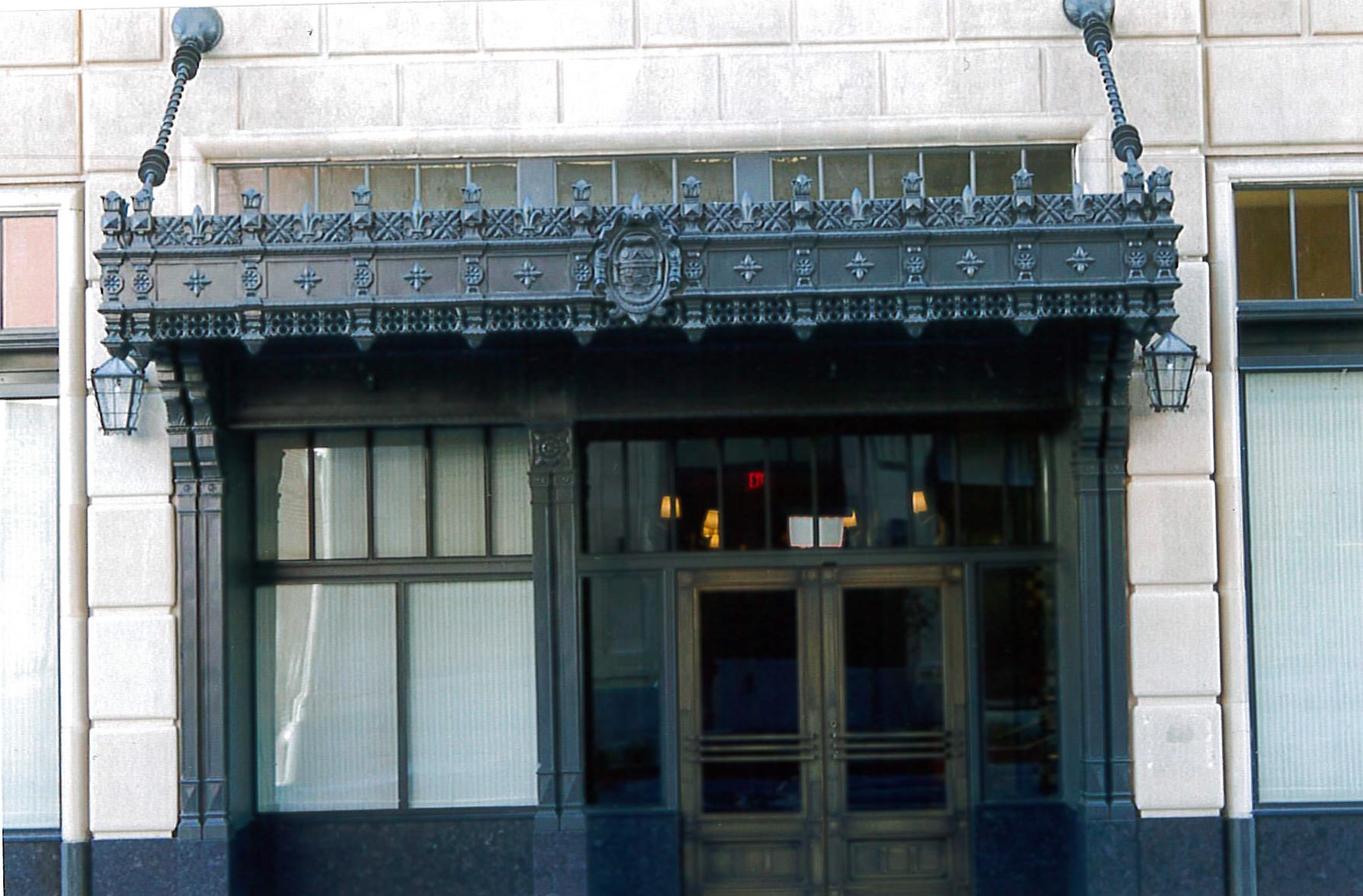 Renovated entry and cast iron marquee 